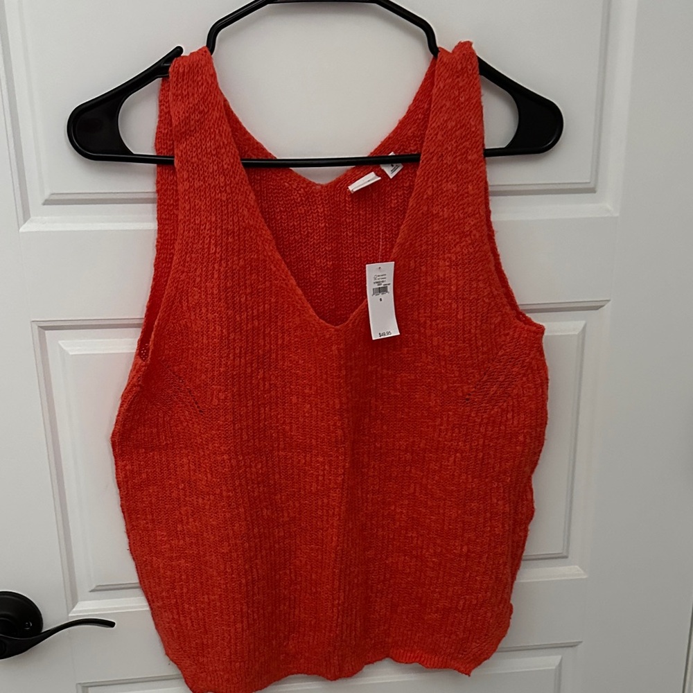 Orange sleeveless top